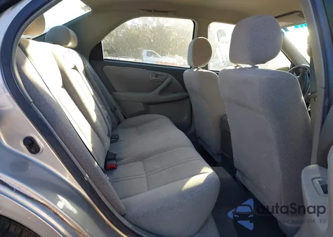 2000 Toyota Camry Le z USA, uszkodzony, nr VIN JT2BG22K5Y0456904